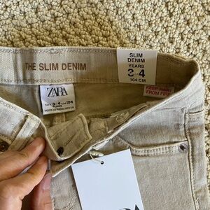 Never worn toddler jeans in tan